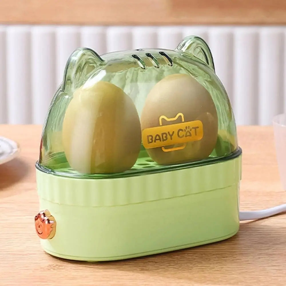 Velmora Living electric egg boiler machine with a transparent lid and steaming tray for hard boiling eggs efficiently.
