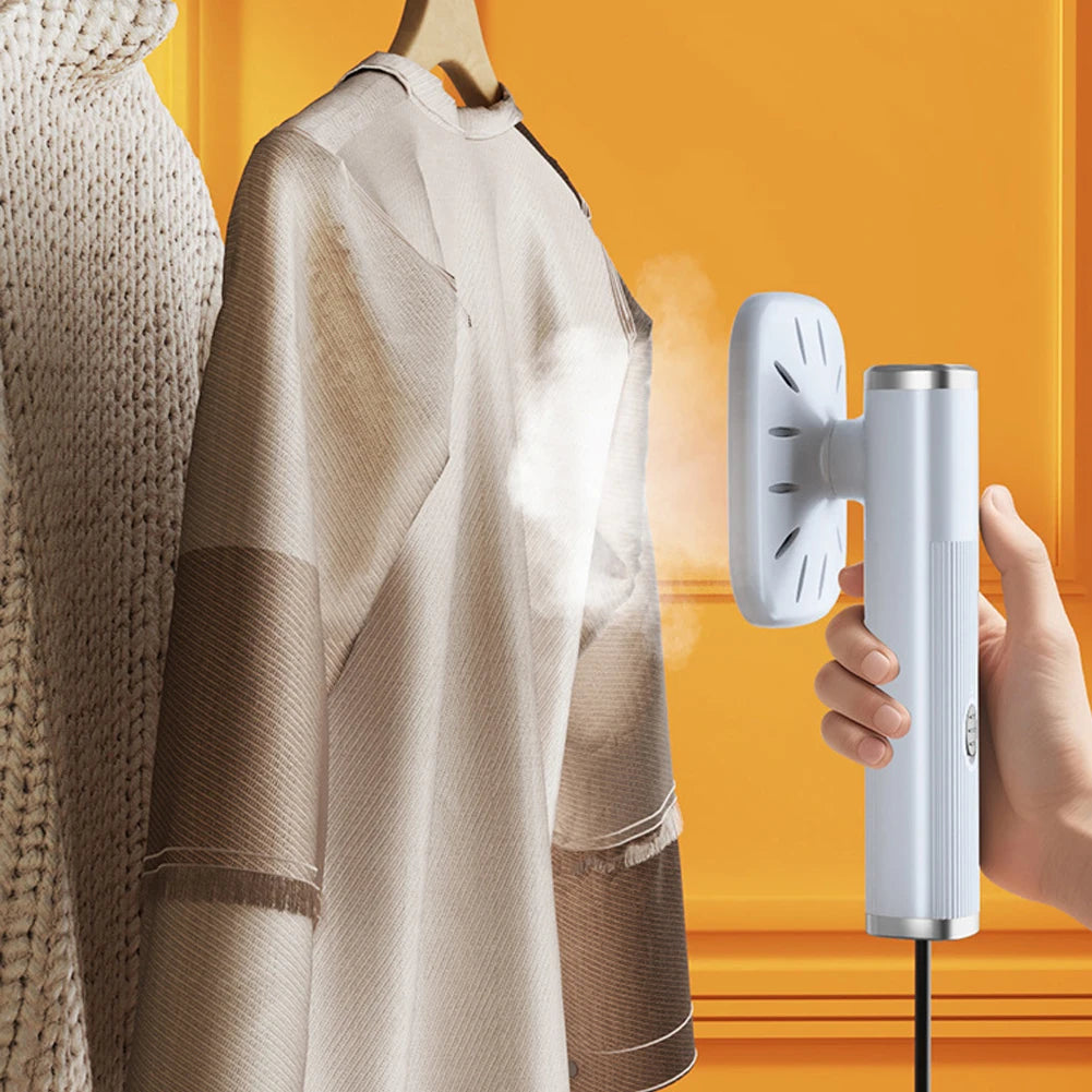 Velmora Living handheld iron steamer with 360° rotation, showing dry and wet steam functions for wrinkle removal.