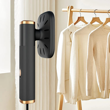 Velmora Living handheld iron steamer with 360° rotating head, showcasing dry and wet steam functions for versatile clothing care.