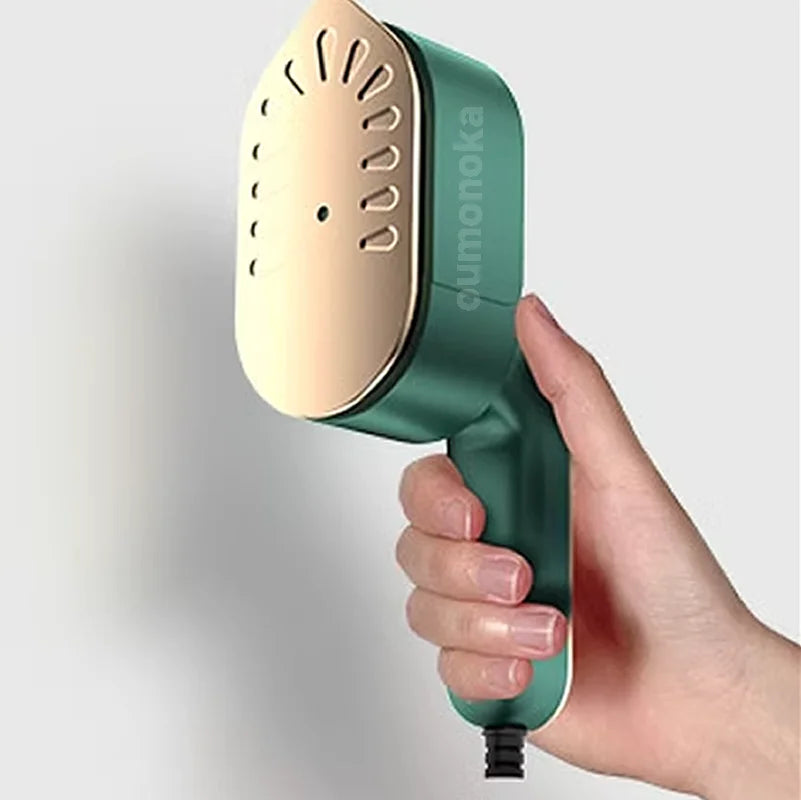 Velmora Living handheld clothing plate iron for smoothing and pressing clothes, shown in use on fabric.